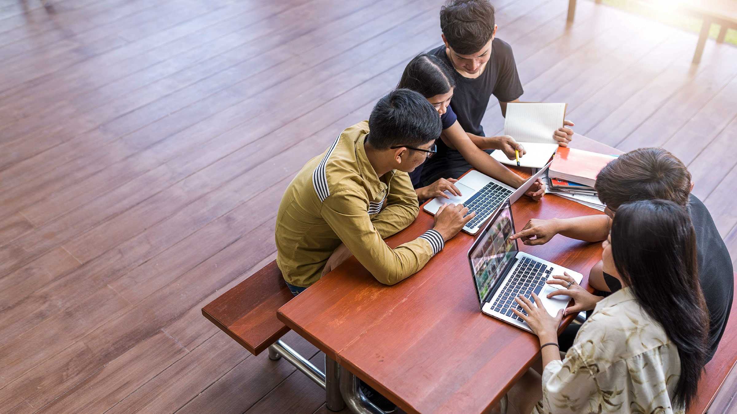 Students working at a desk